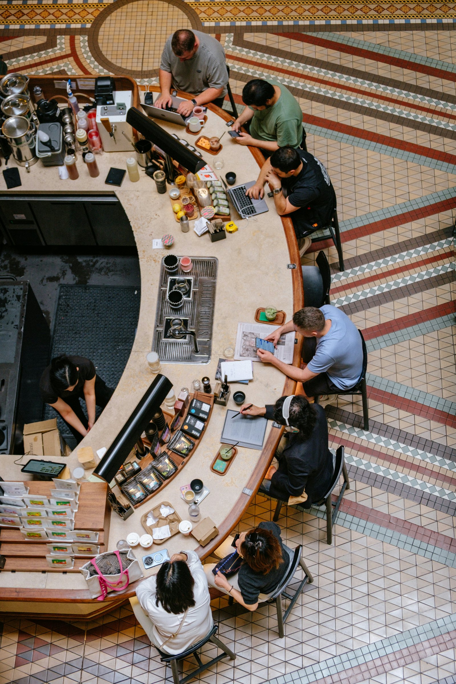 Small business owners at work behind their counter
