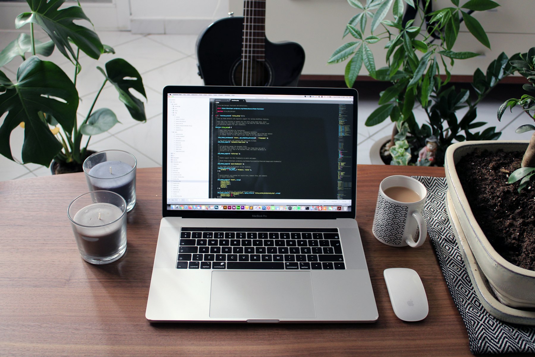 Laptop and coffee mug on a home office desk