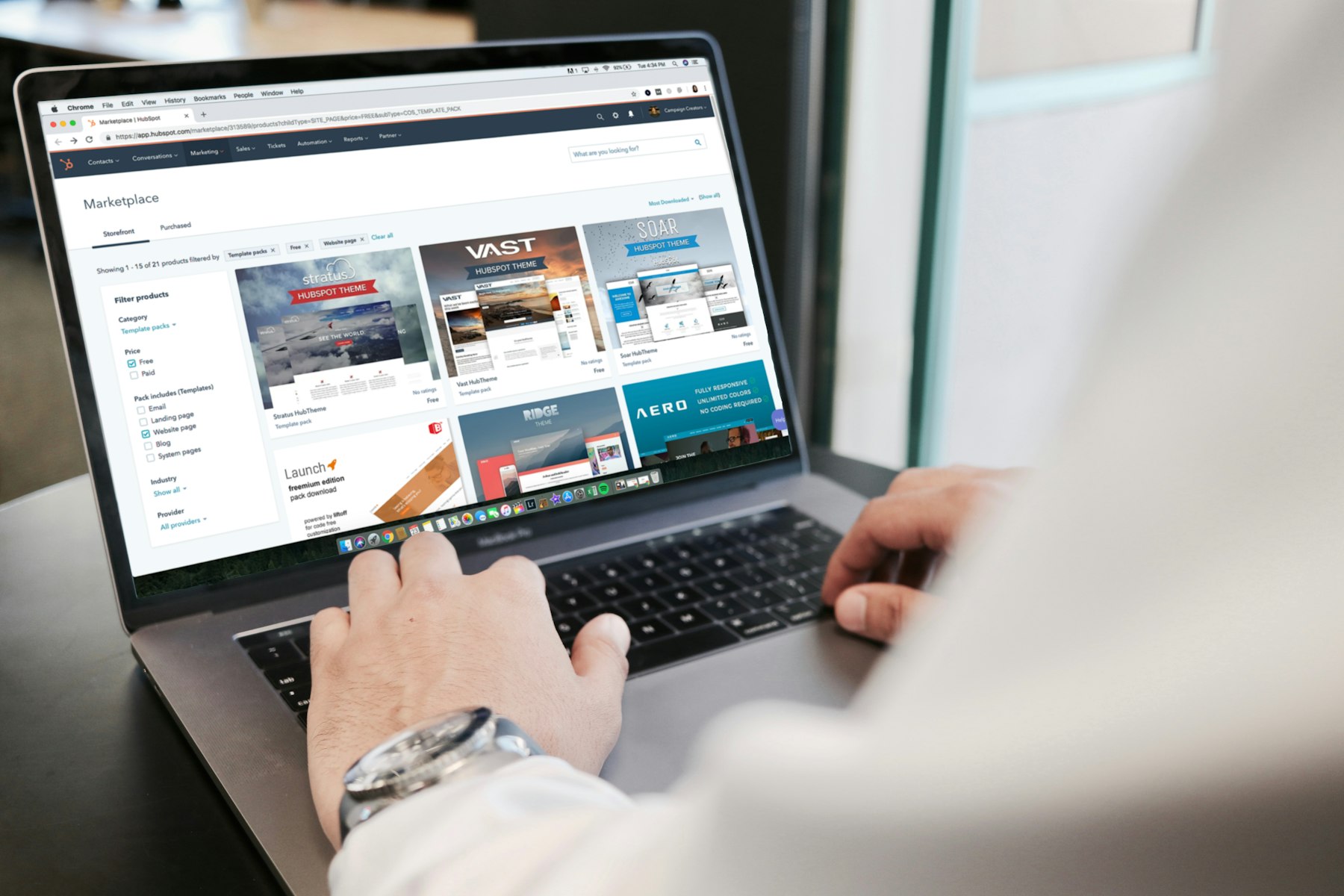 Business owner checking their new website on a laptop